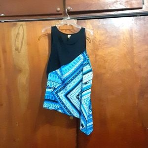 Black, blue and white blouse.